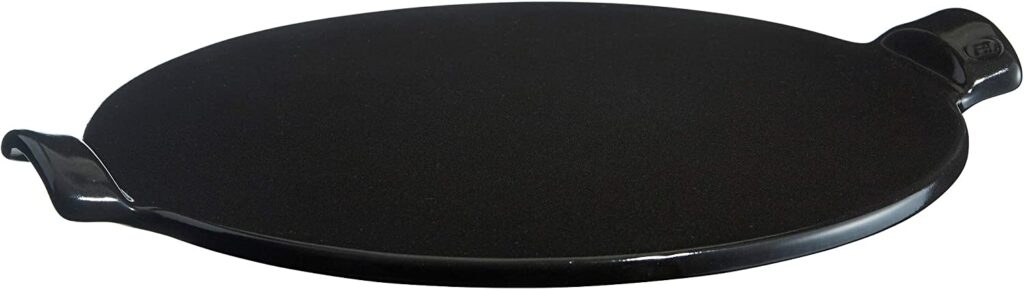 Emile Henry Made in France Flame Top Pizza Stone, Black. Perfect for Pizzas or Breads. In the Oven, On Top of the BBQ. Safe up to 750 degrees F. 100% Natural Clay, Glazed Surface. Easy to Clean.
